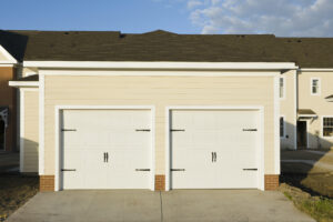 Twin white garage doors